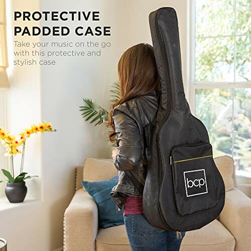 Person with guitar case on back in living room.